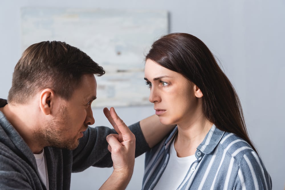 woman in abusive relationship struggling to break a trauma bond