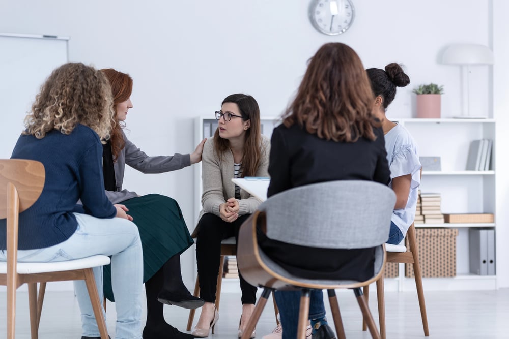 a group of women suffering from trauma attending therapy