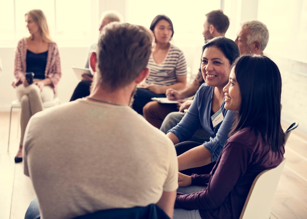 member of group therapy helping each other deal with depression