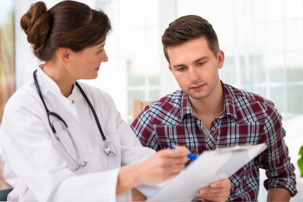 man with medical ptsd already hesitant on what the doctor is saying