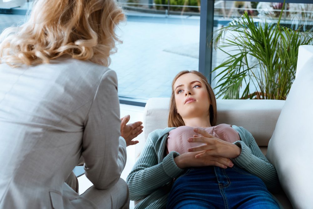 woman affected by trauma getting therapy