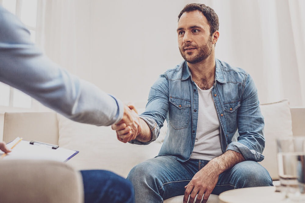 Two men shaking hands