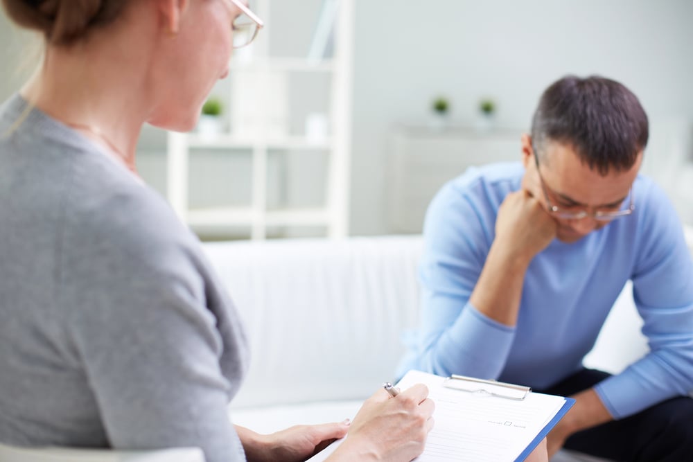 man getting individual therapy session for PTSD and Depression