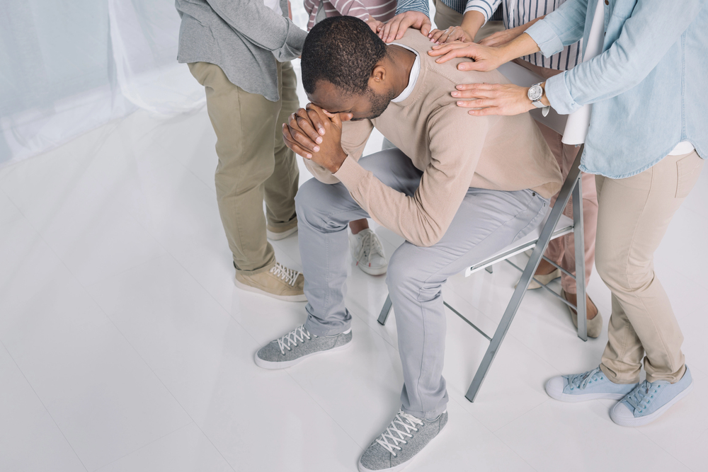 A group providing emotional support for their fellow employee who has depression