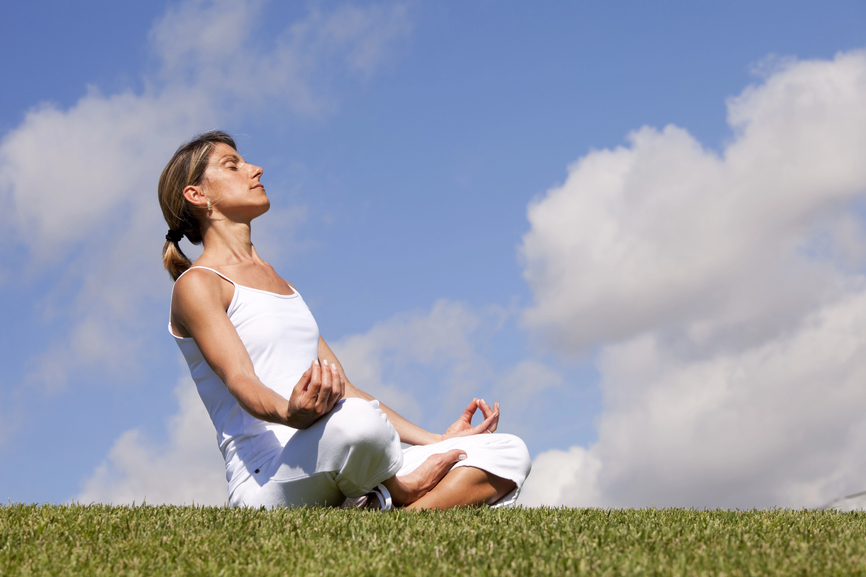 woman doing breathing exercise