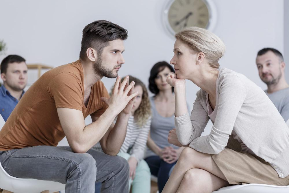 Couple looking to each others eyes in toxic relationship therapy