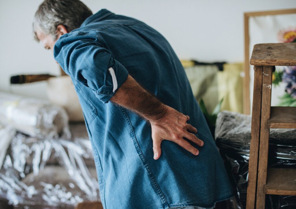 Senior man having back pain probably cause osteoporosis 