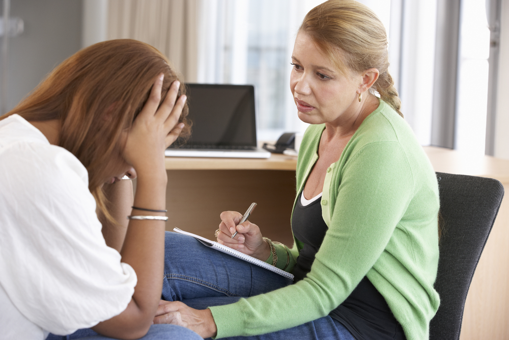 Young Woman Having Counselling Session