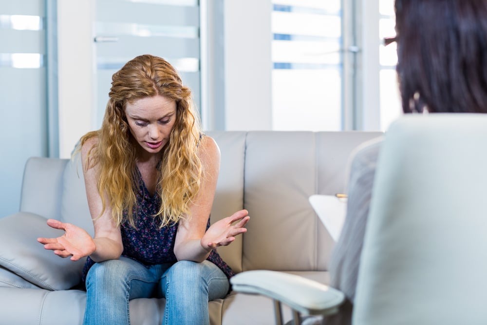 Psychologist talking with her trauma patient in the office