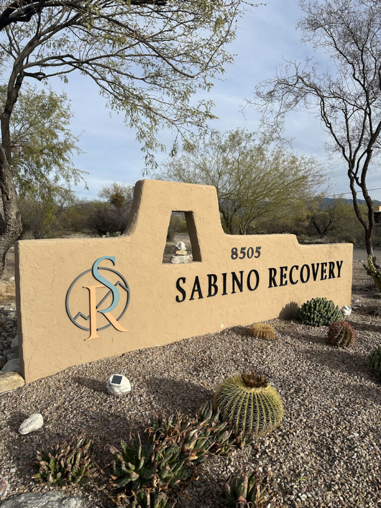 sabino recovery stone sign