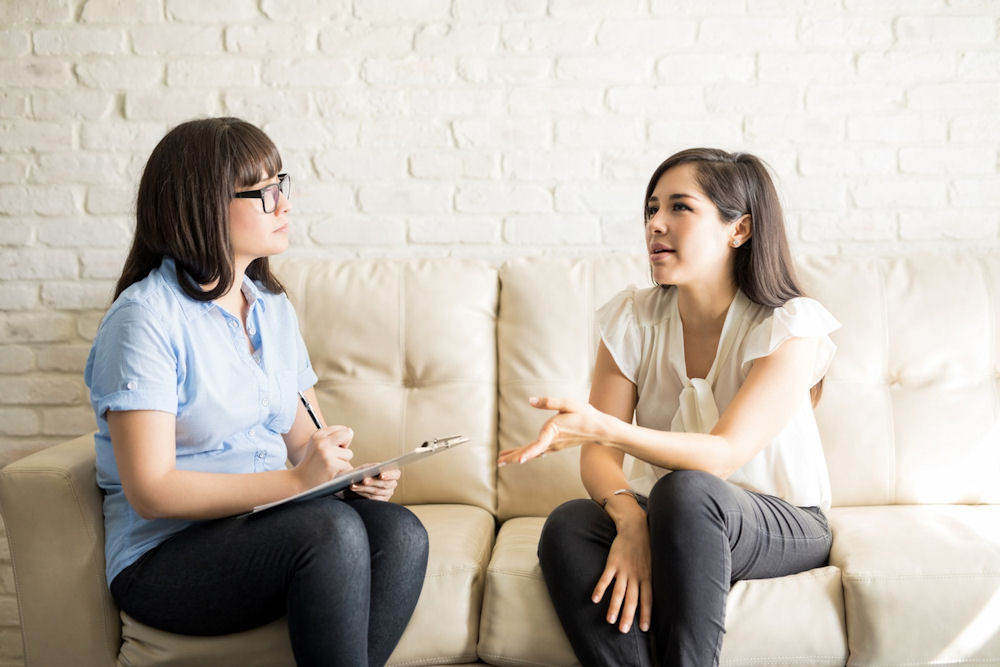 two women speaking