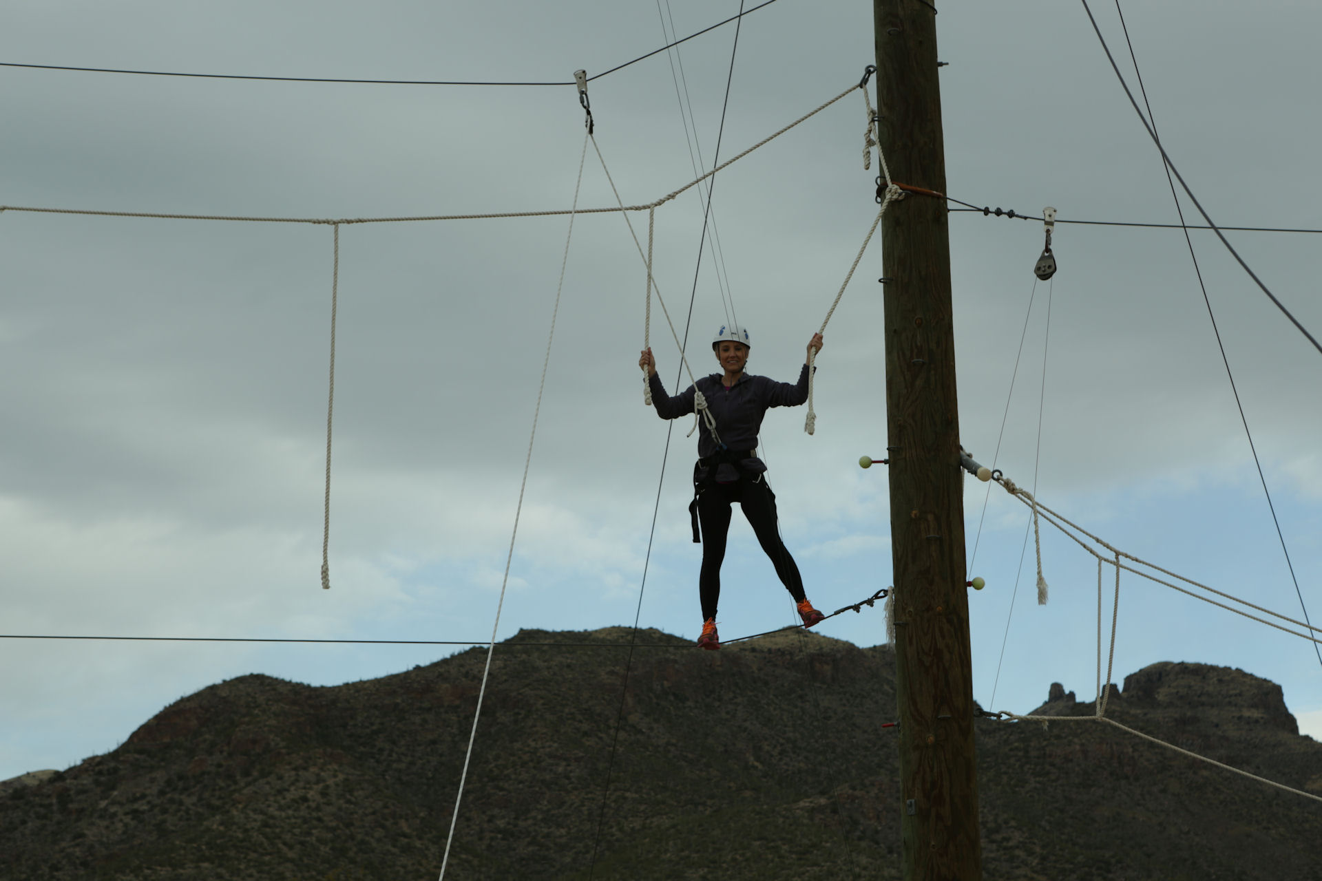 woman doing rope course as Sabino Recovery