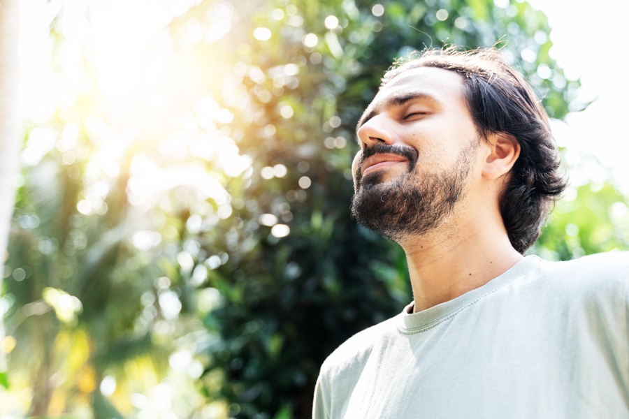 man smiling outside